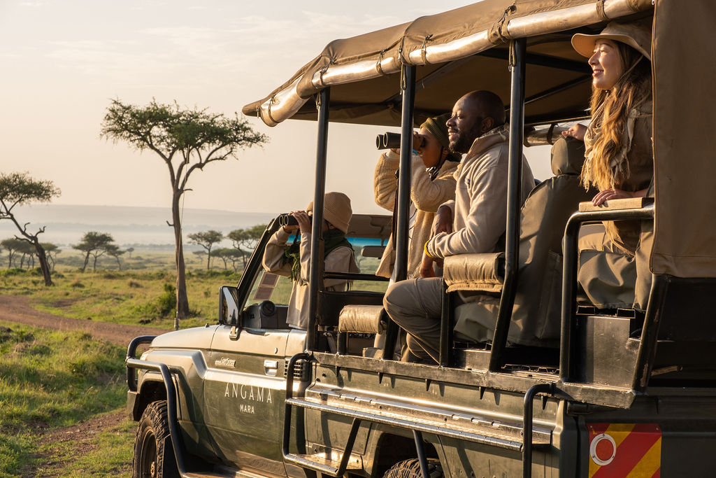 Family on Safari in the Maasai Mara